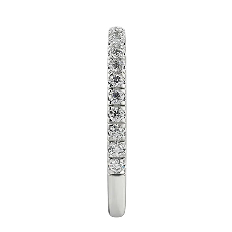 Top-down view of a D-color VVS1 3/4 circle round moissanite wedding band in white gold.