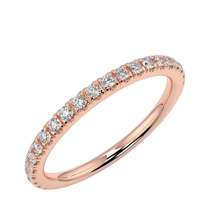 Scattered-style round brilliant moissanite 3/4 eternity band in rose gold ApolloGem.