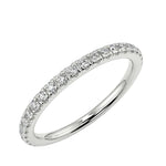Scattered-style round brilliant moissanite 3/4 eternity band in white gold ApolloGem.