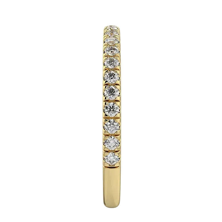 Top-down view of a D-color VVS1 3/4 circle round moissanite wedding band in yellow gold.