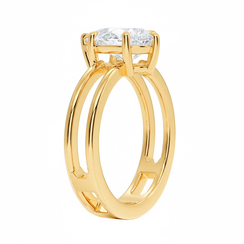 Four-prong round solitaire with a unique split-shank gold band and high-quality GRI certified stone.