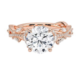 Bespoke round brilliant moissanite engagement ring with a sculpted organic vine band ApolloGem.