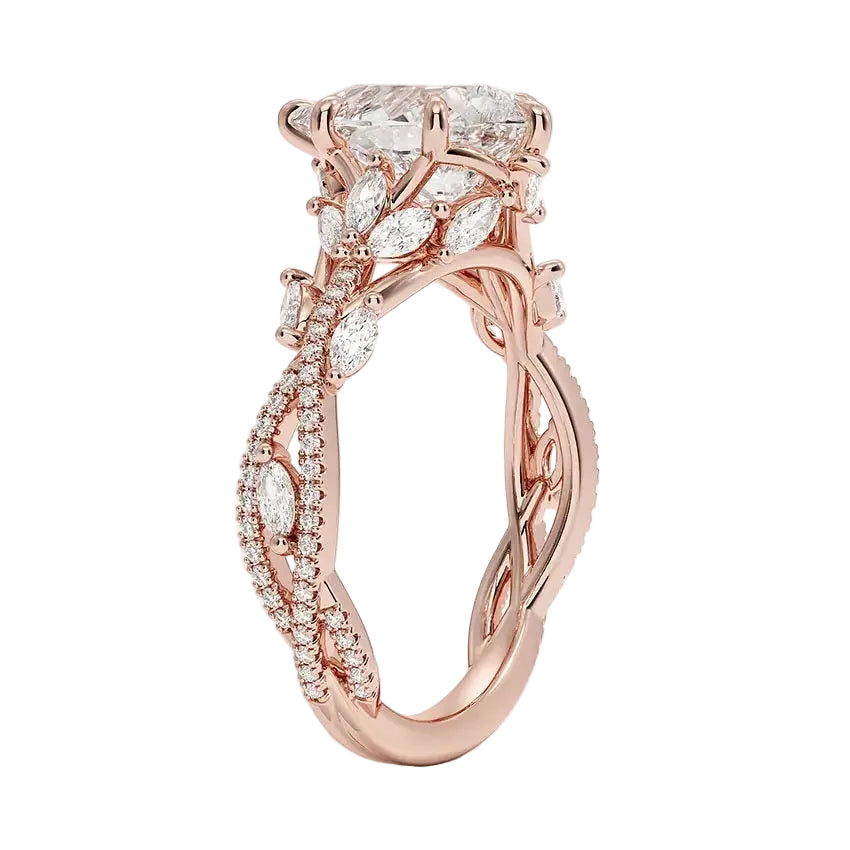 Nature-inspired moissanite ring with six-prong setting and enchanted vine motif in rose gold.