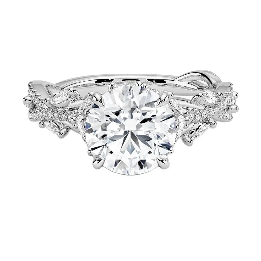 Bespoke round brilliant moissanite engagement ring with a sculpted organic vine band ApolloGem.