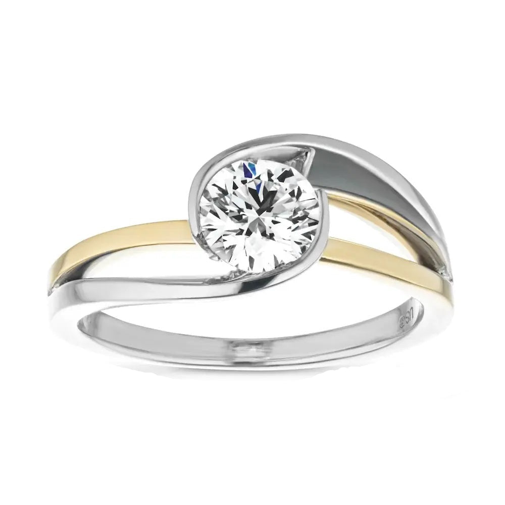 Modern round brilliant moissanite engagement ring with a two-tone white and yellow gold wrap setting ApolloGem.