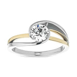Modern round brilliant moissanite engagement ring with a two-tone white and yellow gold wrap setting ApolloGem.