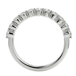 Top-down view of a D-color VVS1 2.0mm round stone half-eternity band in white gold.