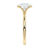 Engagement ring Round cut Moissanite lab grown diamond engagement ring  with open tube setting, on a gold band, against a white background.Moissanite engagement ring cape town south africa grand diamonds ralph jacobs jeulia 