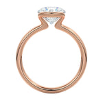 Engagement ring Round cut Moissanite lab grown diamond engagement ring  with open tube setting, on a gold band, against a white background.Moissanite engagement ring cape town south africa grand diamonds ralph jacobs jeulia 