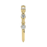 Top-down view of a D-color VVS1 2.0mm round stone bezel-set band in yellow gold.