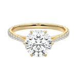 Royal six-prong round brilliant moissanite cathedral ring with a tapered pavé yellow gold band ApolloGem.