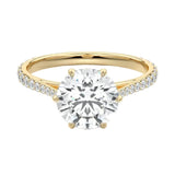 Royal six-prong round brilliant moissanite cathedral ring with a tapered pavé yellow gold band ApolloGem.