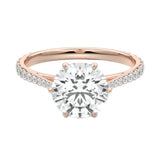 Royal six-prong round brilliant moissanite cathedral ring with a tapered pavé rose gold band ApolloGem.