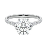 Royal six-prong round brilliant moissanite cathedral ring with a tapered pavé white gold band ApolloGem.