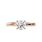 Close-up of a D-color VVS1 round moissanite held by elegant, sophisticated cathedral prongs.
