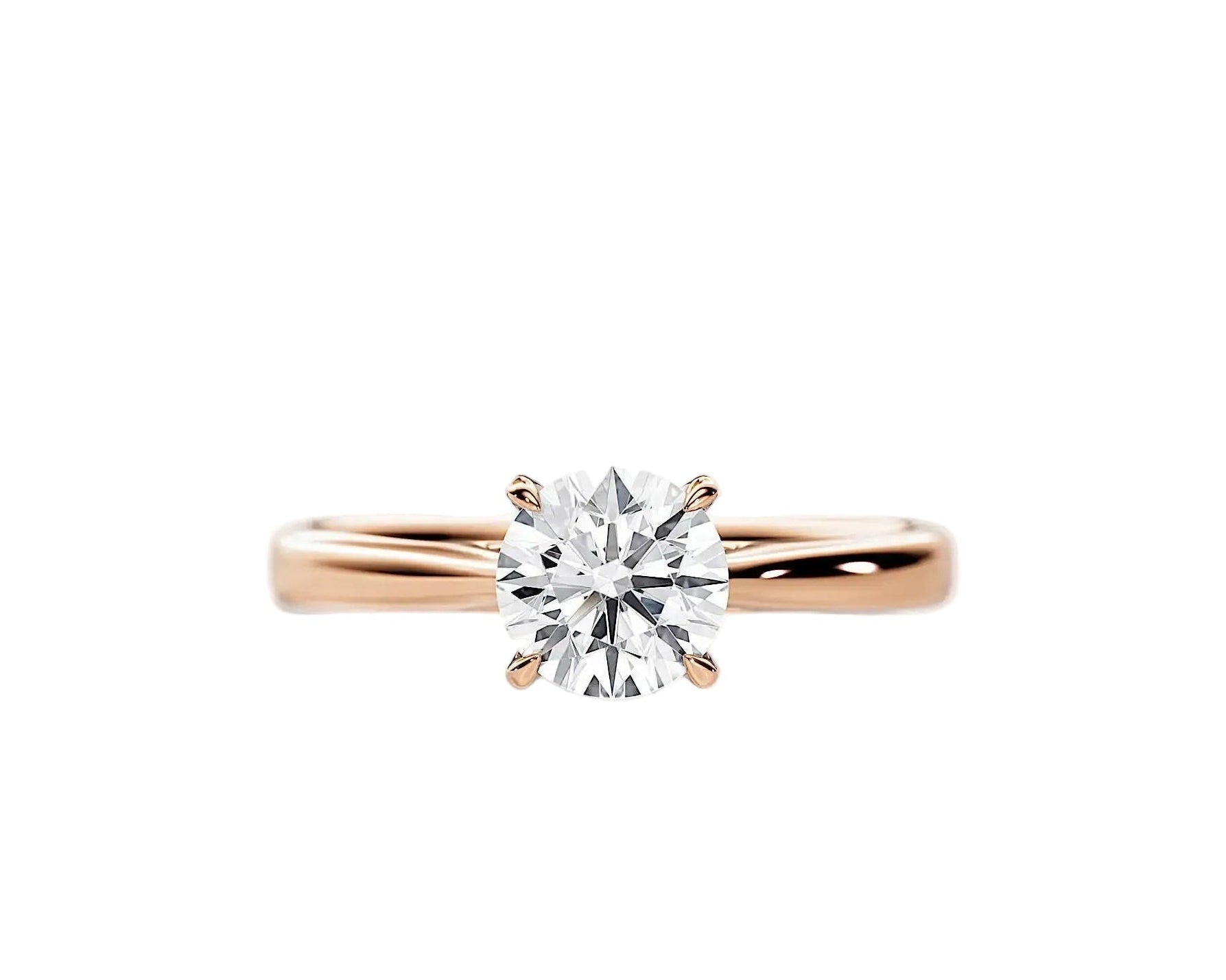 Close-up of a D-color VVS1 round moissanite held by elegant, sophisticated cathedral prongs.