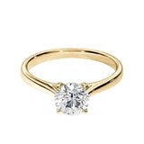 Close-up of a D-color VVS1 round moissanite held by elegant, sophisticated cathedral prongs.