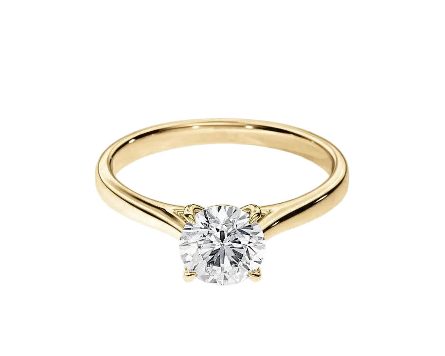 Close-up of a D-color VVS1 round moissanite held by elegant, sophisticated cathedral prongs.
