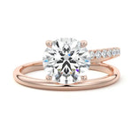 Modern floating round brilliant moissanite ring with a pavé spiral wrap band in rose gold ApolloGem.