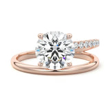 Modern floating round brilliant moissanite ring with a pavé spiral wrap band in rose gold ApolloGem.