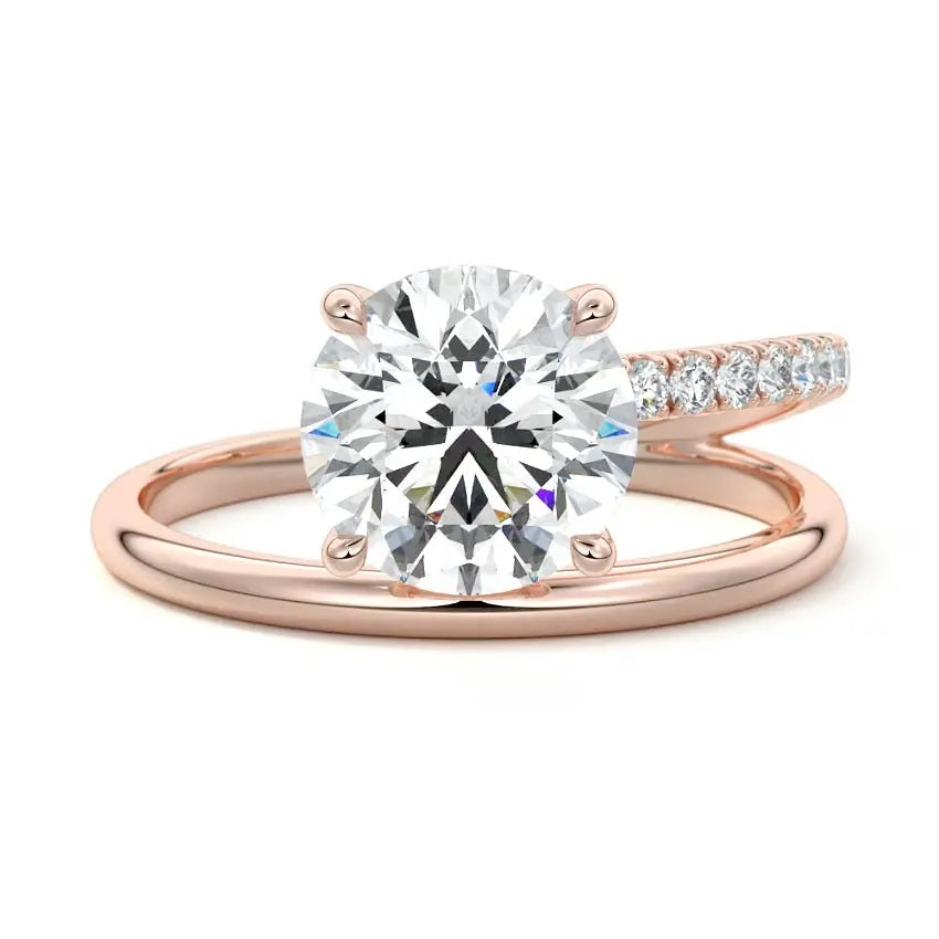 Modern floating round brilliant moissanite ring with a pavé spiral wrap band in rose gold ApolloGem.