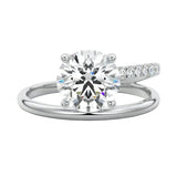 Modern floating round brilliant moissanite ring with a pavé spiral wrap band in white gold ApolloGem.