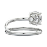 Side profile of the Celestial Spiral ring showing the architectural wrap-around shank and refined basket.