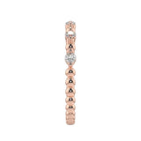 Side profile of the Round Channel Half-Eternity band showing the polished solid rose gold shank.