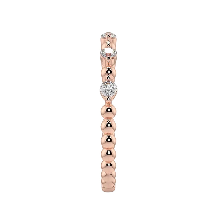 Side profile of the Round Channel Half-Eternity band showing the polished solid rose gold shank.