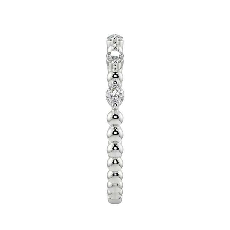 Side profile of the Round Channel Half-Eternity band showing the polished solid white gold shank.