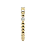 Side profile of the Round Channel Half-Eternity band showing the polished solid yellow gold shank.