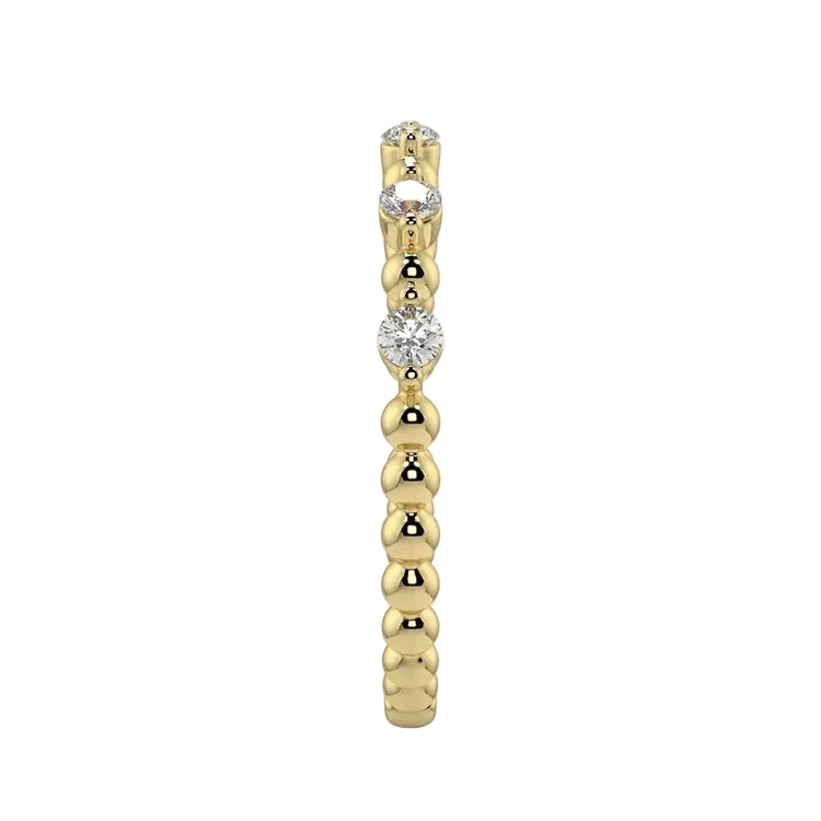 Side profile of the Round Channel Half-Eternity band showing the polished solid yellow gold shank.