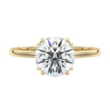 Luxury round brilliant moissanite solitaire engagement ring with double cat-claw prongs in yellow gold ApolloGem South Africa.