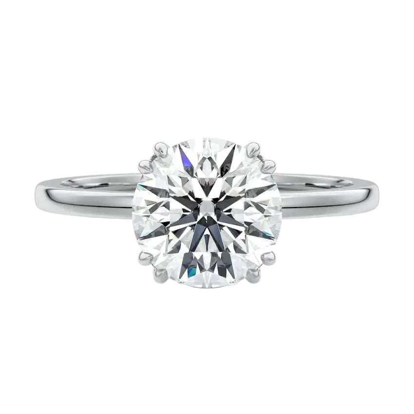 Luxury round brilliant moissanite solitaire engagement ring with double cat-claw prongs in white gold ApolloGem South Africa.