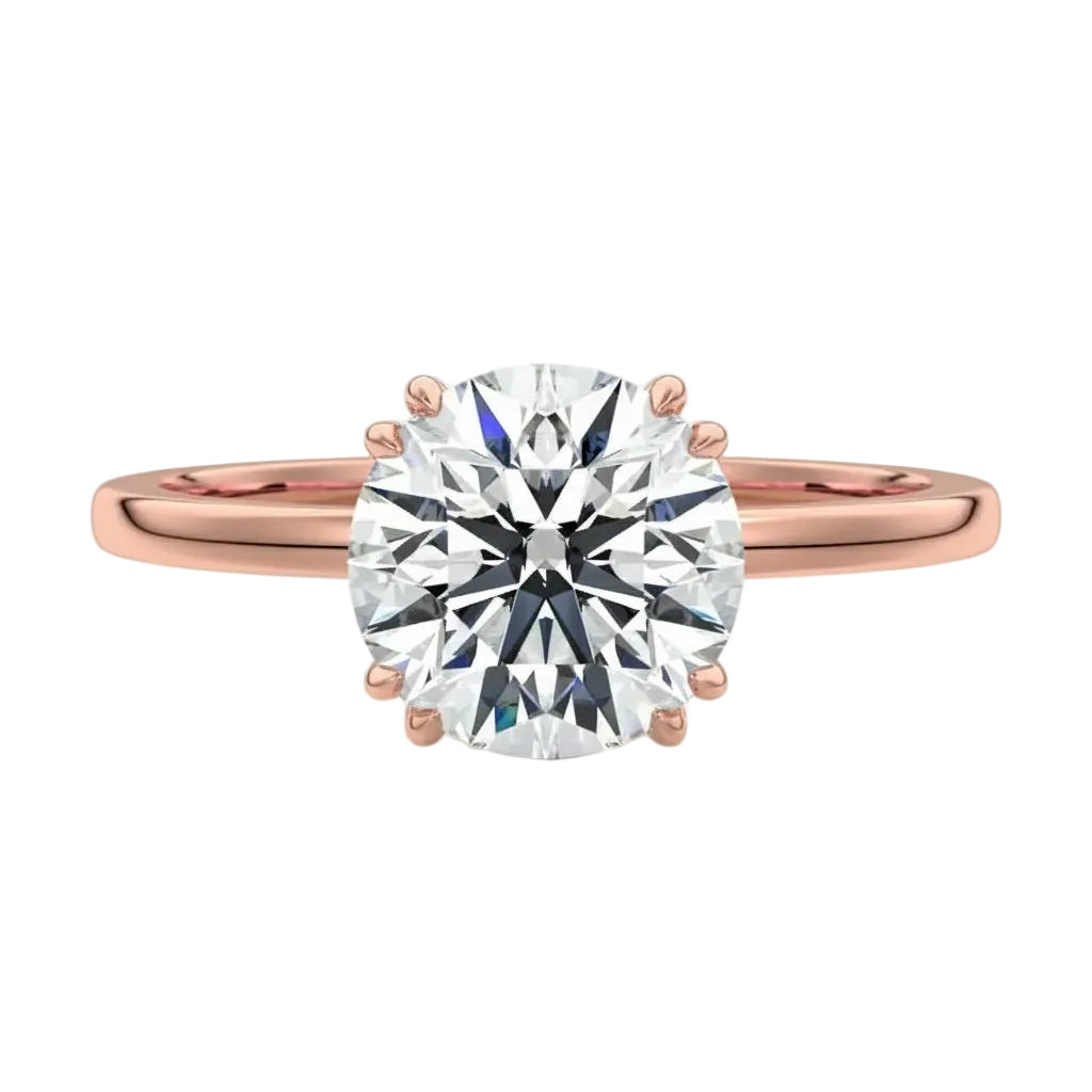 Luxury round brilliant moissanite solitaire engagement ring with double cat-claw prongs in rose gold ApolloGem South Africa.