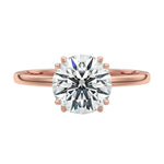 Luxury round brilliant moissanite solitaire engagement ring with double cat-claw prongs in rose gold ApolloGem South Africa.
