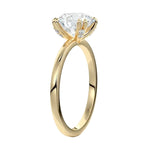 Four-point double-prong round solitaire engagement ring with a high-quality GRI certified stone and accent prongs.