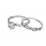 Organic nature-inspired moissanite bridal set with hand-set accent stones in solid white gold.