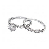Organic nature-inspired moissanite bridal set with hand-set accent stones in solid white gold.