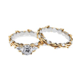 Unique two-tone round brilliant moissanite engagement ring with pear-cut side stones Duo Collection ApolloGem.