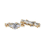 Two gold and silver rings with diamond accents on a white background