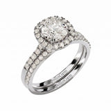 Diamond ring with a halo and side stones on a white background, featuring the ApolloGem brand.