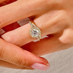 The Round Duo Halo Wave set on a finger showing the organic curved silhouette and unified fire.