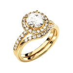 Yellow gold moissanite bridal set with a round halo solitaire and asymmetrical pavé wedding ring.