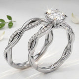Side profile of the Helix Wrap ring showing micro-pavé stones encircling the moissanite base.