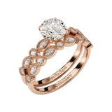 Rose gold moissanite bridal set with a round solitaire and matching vintage-style wedding band.