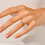 The Round Duo Leaf Accent set on a finger showing the elegant organic silhouette and fire.