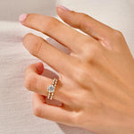 The Round Duo Mosaic set on a finger showing the intense sparkle and unified silhouette.