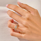 The Round Duo Mosaic set on a finger showing the intense sparkle and unified silhouette.