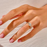 The Round Duo Pavé set on a finger showing unified brilliance and a sophisticated silhouette.